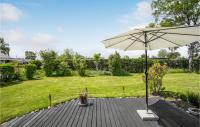 Zahrada ubytování Three-Bedroom Holiday Home In Odder