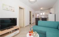 Televízia a/alebo spoločenská miestnosť v ubytovaní Holiday Home Peljesac-Dingac-Potocine With Outdoor Pool