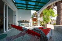 Posedenie v ubytovaní Ferienwohnung in Costa Calma mit Terrasse, gemeinsamem Pool und Grill