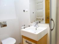 Kúpeľňa v ubytovaní Apartamenty Miku