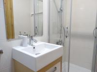 Kúpeľňa v ubytovaní Apartamenty Miku