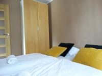 Posteľ alebo postele v izbe v ubytovaní Apartamenty Miku