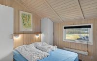 Postel nebo postele na pokoji v ubytování Holiday Home Drejet Rudkøbing V