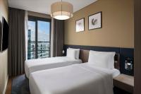 Postel nebo postele na pokoji v ubytování Radisson Residences Vadistanbul