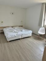 Łóżko lub łóżka w pokoju w obiekcie Résidence Graziella Appartement 510