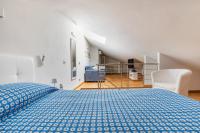 A bed or beds in a room at Elena House Apartments