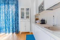 A kitchen or kitchenette at Elena House Apartments