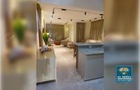 a room with a kitchen and a living room at للايجار ايام الصيف فيلا فاخره بستيلا هايتس - الساحل الشمالي in El Alamein