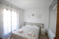 Postel nebo postele na pokoji v ubytování Casas Blancas 27