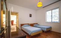 Posteľ alebo postele v izbe v ubytovaní Awesome Apartment In Preko With Jacuzzi