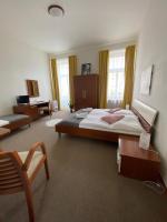 Postel nebo postele na pokoji v ubytování Pivovarský Hotel