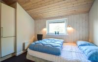 Postel nebo postele na pokoji v ubytování Pet Friendly Home In Rømø With Kitchen