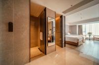 UrCove By HYATT Chengdu Wenshu Monasteryにあるベッド