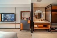 UrCove By HYATT Chengdu Wenshu Monasteryにあるベッド