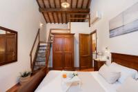 A bed or beds in a room at Holiday home in Villamagna - Toskana 44123