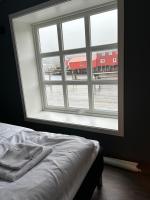 Postel nebo postele na pokoji v ubytování Buodden Rorbuer - Fisherman Cabins Sørvågen