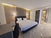 El Mesaadya Hotel فندق المساعديةにあるベッド
