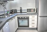 Kuchyň nebo kuchyňský kout v ubytování Apartamento Los Olivos Jerez