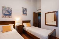 A bed or beds in a room at Holiday home in Villamagna - Toskana 44123