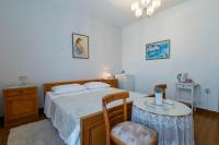 Posteľ alebo postele v izbe v ubytovaní Marin Apartments