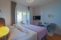 Posteľ alebo postele v izbe v ubytovaní Marin Apartments