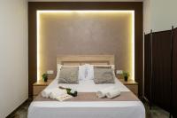 Posteľ alebo postele v izbe v ubytovaní Apartamento Turistico Lux Center