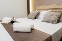 Posteľ alebo postele v izbe v ubytovaní Apartamento Turistico Lux Center