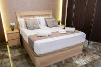 Posteľ alebo postele v izbe v ubytovaní Apartamento Turistico Lux Center