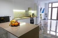 Kuchyňa alebo kuchynka v ubytovaní Apartamento Turistico Lux Center