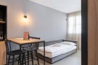 A bed or beds in a room at Residence - Palais Hörtenberg