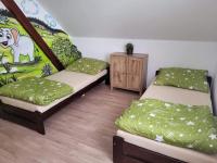 Postel nebo postele na pokoji v ubytování Vysočina, Fryšava 199 - Chalupa pod kopcem
