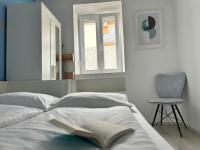 Posteľ alebo postele v izbe v ubytovaní Apartment Sara