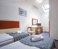 Postel nebo postele na pokoji v ubytování Hotel Atos