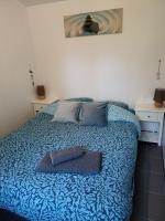 Łóżko lub łóżka w pokoju w obiekcie Gîte Nature et détente
