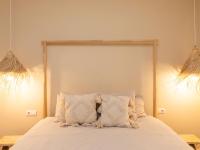 A bed or beds in a room at Apartment Sea Suite by Interhome