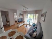 TV a/nebo společenská místnost v ubytování Apartamento a 300 mts de la playa, 25 minutos de Port Aventura y 50 de Barcelona