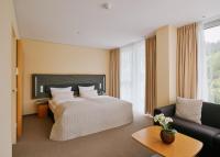 Ein Bett oder Betten in einem Zimmer der Unterkunft Lufthansa Seeheim - More than a Conference Hotel