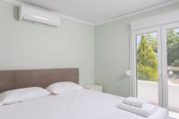 Posteľ alebo postele v izbe v ubytovaní Villa Baycasa