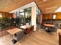 Un lugar para sentarse en Hôtellerie L'Enclos Rey