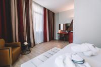 Łóżko lub łóżka w pokoju w obiekcie Mercure Roma Piazza Bologna