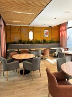 Un lugar para sentarse en Hôtellerie L'Enclos Rey