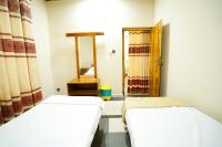 CatRay Inn - Batticaloaにあるベッド