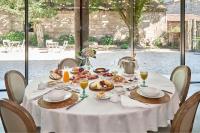 a white table with food on top of it at Solar de Vilar Seco in Vilar Seco