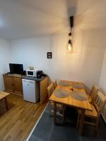 Kuchyň nebo kuchyňský kout v ubytování Apartments Dřevona II