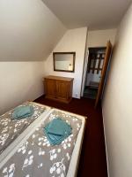 Postel nebo postele na pokoji v ubytování Apartments Dřevona II