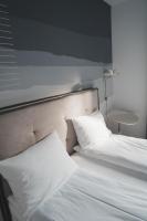 Łóżko lub łóżka w pokoju w obiekcie Villa Monica Apartamenty