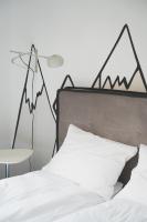Łóżko lub łóżka w pokoju w obiekcie Villa Monica Apartamenty