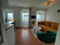 Kuchyň nebo kuchyňský kout v ubytování Apartmani Obala