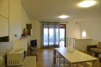 Televízia a/alebo spoločenská miestnosť v ubytovaní Residence Boschetti
