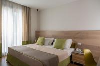 Łóżko lub łóżka w pokoju w obiekcie Hotel Petrarca Terme